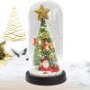Karácsonyi világító és zenélő fenyőfa búrában, mikulással